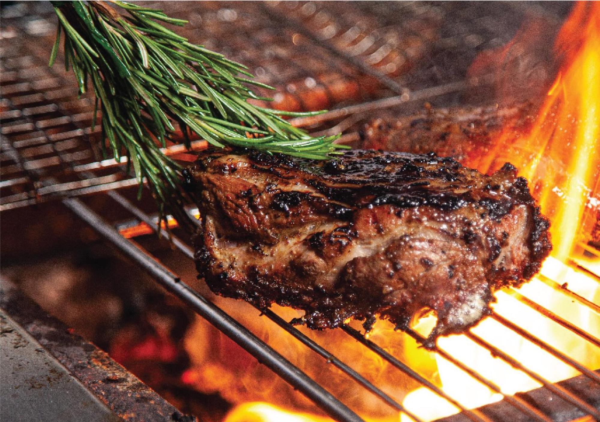 Jumeirah Messilah Beach Kuwait Kuvait Kültér fotó A steak being grilled